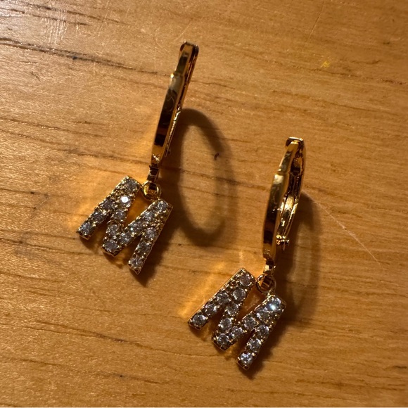 Jewelry - Gold Tone Huggie Rhinestone M Earrings